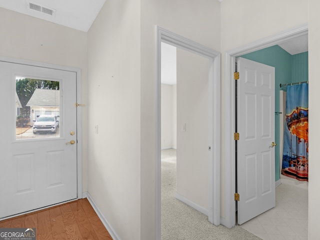 doorway featuring light hardwood / wood-style floors