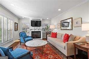 living room with crown molding