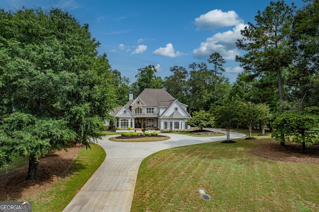 view of front of home with a front lawn