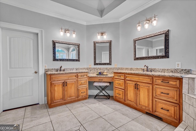 bathroom featuring tile patterned floors, vanity, a tray ceiling, and ornamental molding