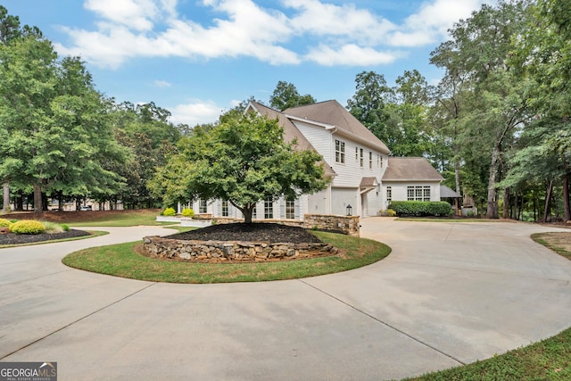 view of property exterior with a garage