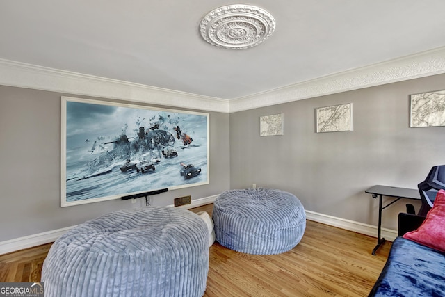 interior space with wood-type flooring and crown molding