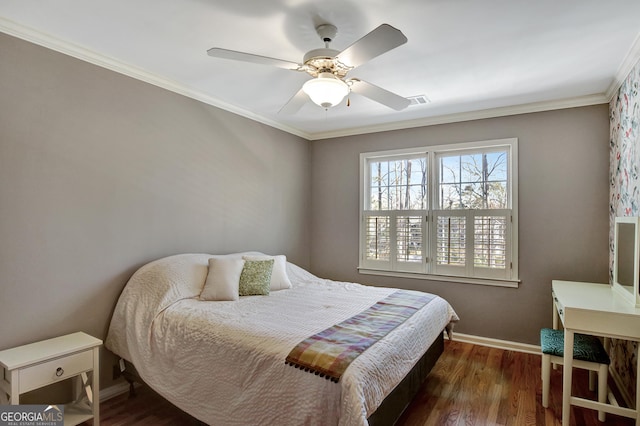 bedroom with crown molding, ceiling fan, and dark hardwood / wood-style flooring