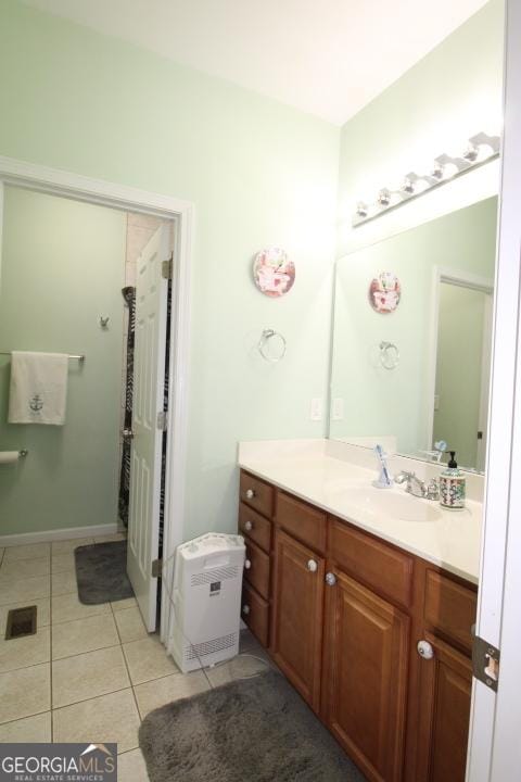 bathroom featuring vanity and tile patterned floors