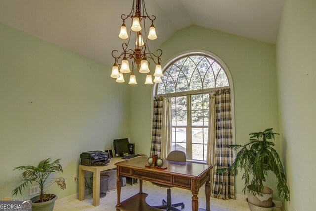 home office with vaulted ceiling and a chandelier