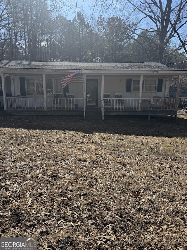 view of front of home featuring covered porch