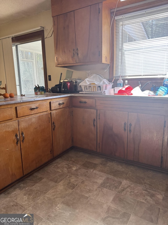 kitchen featuring a textured ceiling