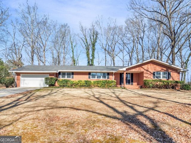 ranch-style home with a garage