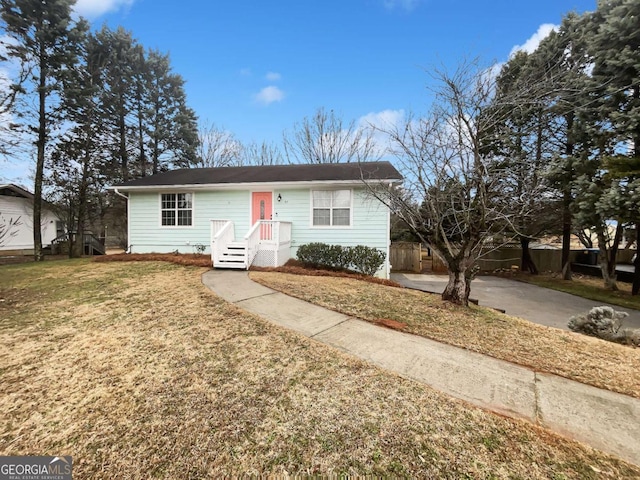 view of front of home with a front yard