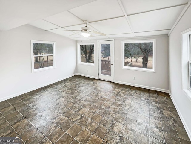 spare room with lofted ceiling and ceiling fan