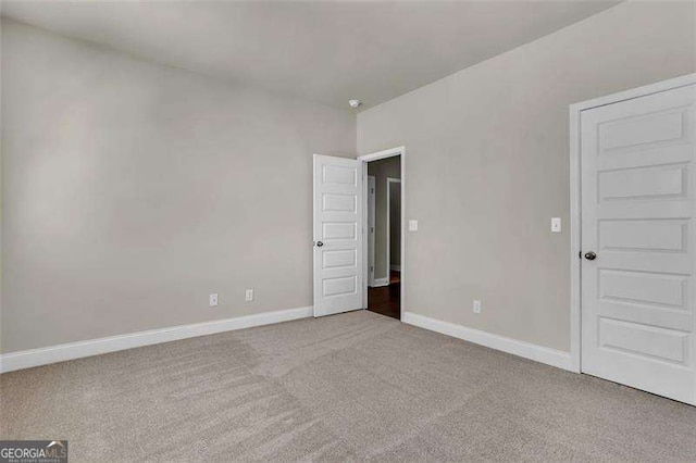 unfurnished bedroom with carpet