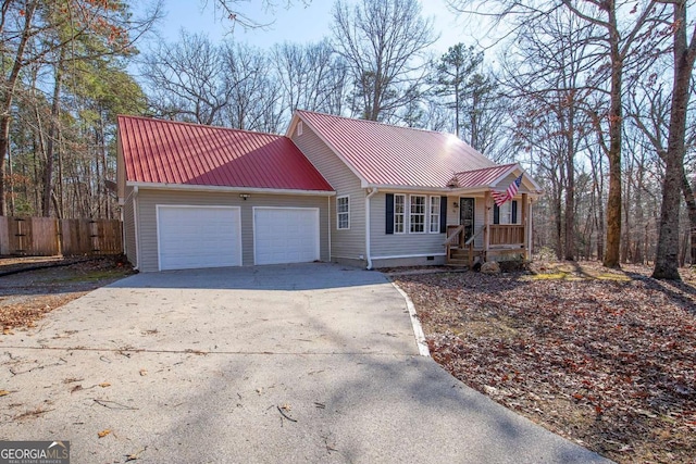 view of front of property featuring a garage