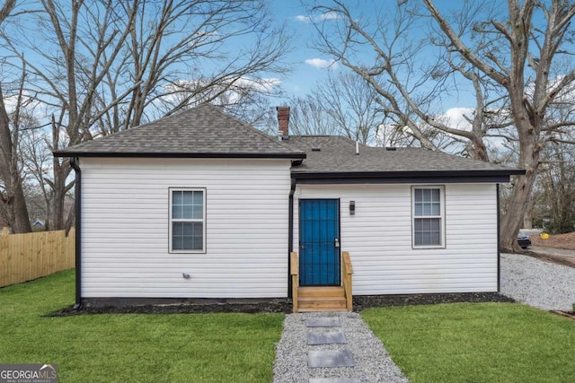 view of front of house with a front lawn