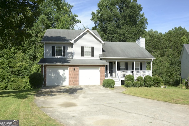 3013 Pommel Ct, Conyers, GA 30013 - split level home featuring covered porch, driveway, a garage, and a front yard