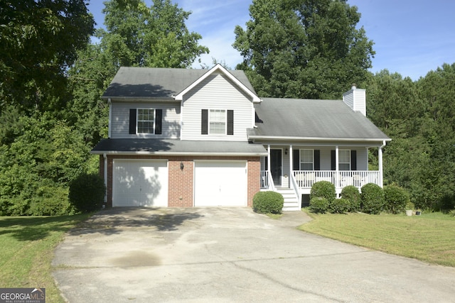 3013 Pommel Ct, Conyers, GA 30013 - tri-level home with a porch, a garage, driveway, brick siding, and a front yard