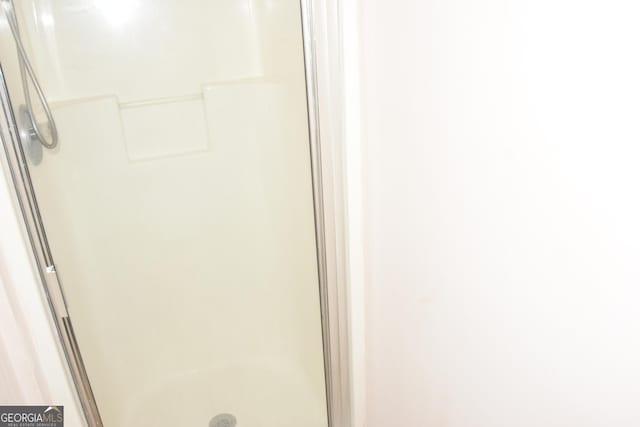 3013 Pommel Ct, Conyers, GA 30013 - bathroom with a stall shower