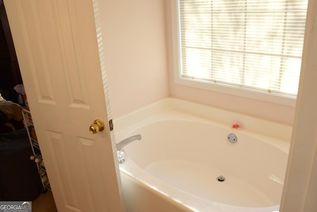 3013 Pommel Ct, Conyers, GA 30013 - full bathroom with a garden tub