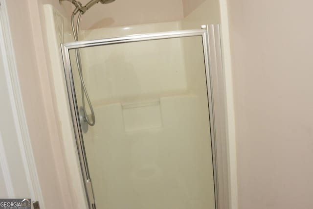 3013 Pommel Ct, Conyers, GA 30013 - bathroom featuring a shower stall