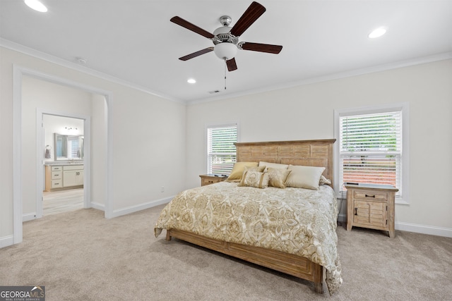 carpeted bedroom with crown molding, ceiling fan, connected bathroom, and multiple windows