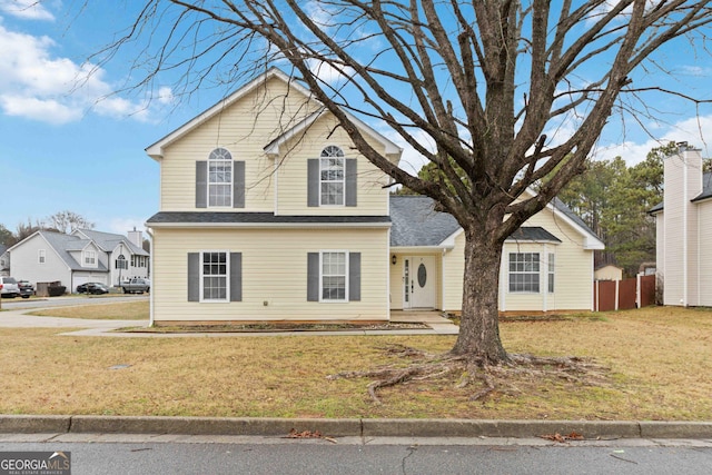 front of property featuring a front lawn