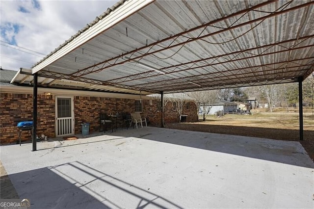 view of patio featuring a carport