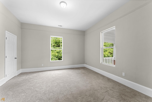 empty room featuring carpet floors