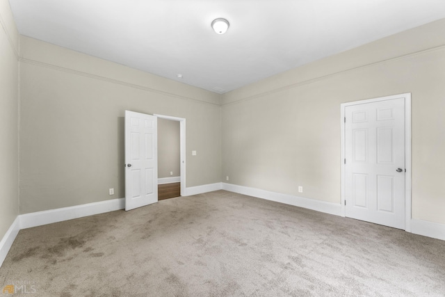 unfurnished room with carpet