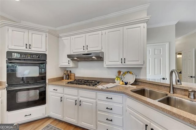 kitchen with white cabinetry, sink, crown molding, and double oven