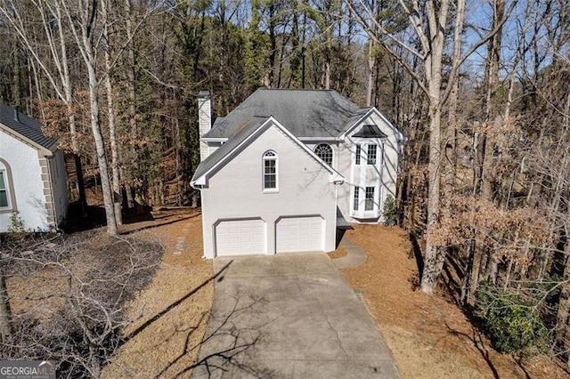 front of property with a garage