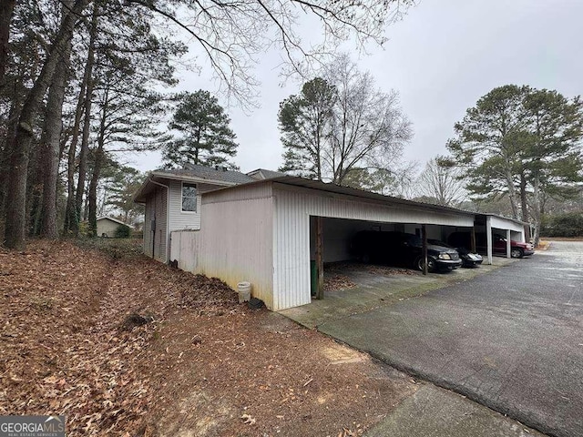 view of side of home with a garage