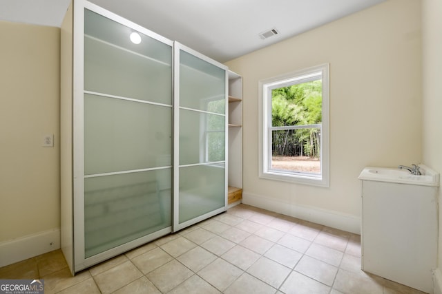 bathroom featuring tile patterned flooring