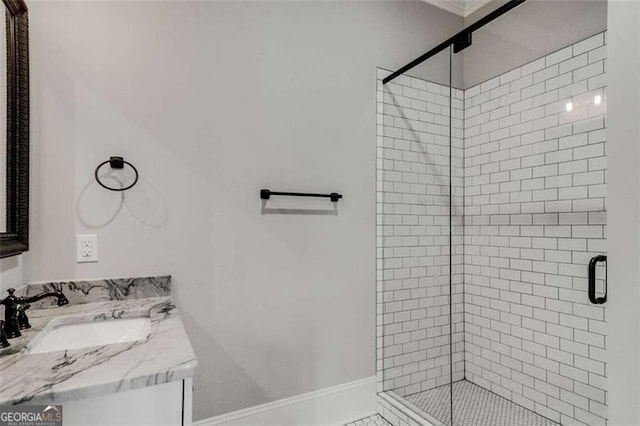 bathroom featuring vanity and a shower with shower door