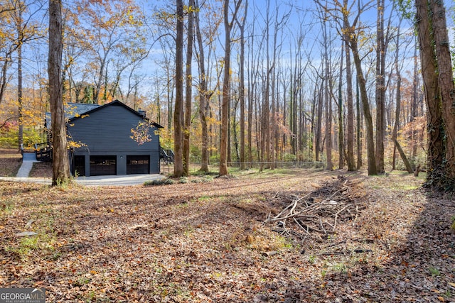 view of yard featuring a garage