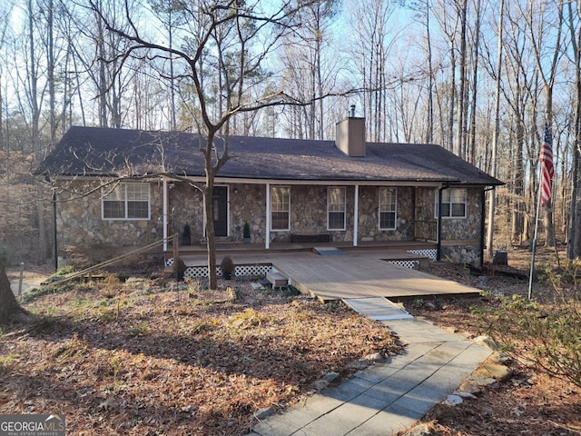 exterior space featuring a wooden deck