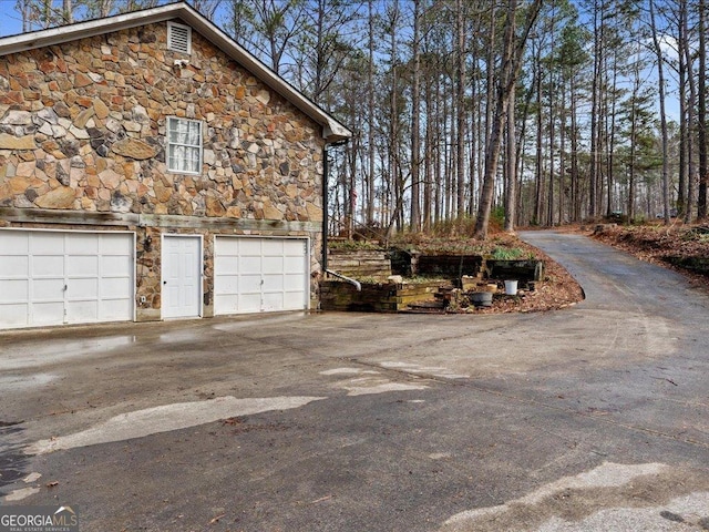 view of home's exterior featuring a garage