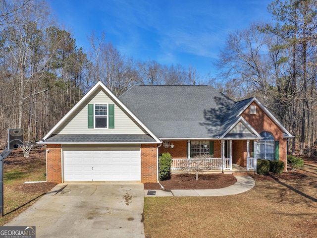 view of front of home with a garage and covered porch