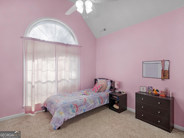 bedroom featuring lofted ceiling, light carpet, and ceiling fan