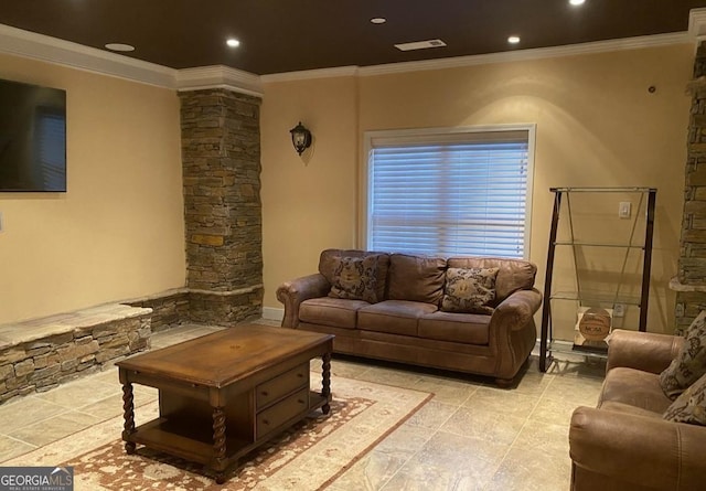 living room featuring crown molding