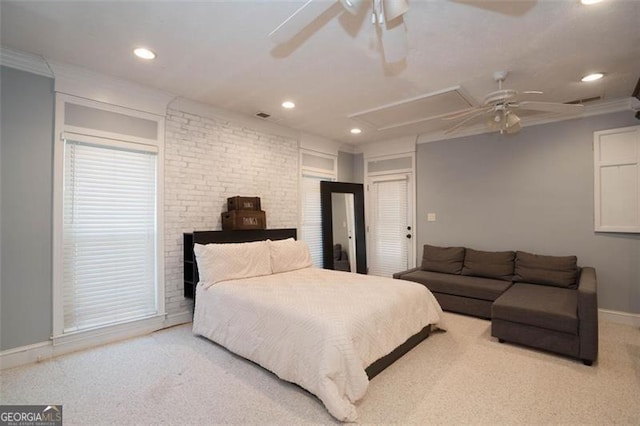 bedroom with ceiling fan, ornamental molding, and light carpet