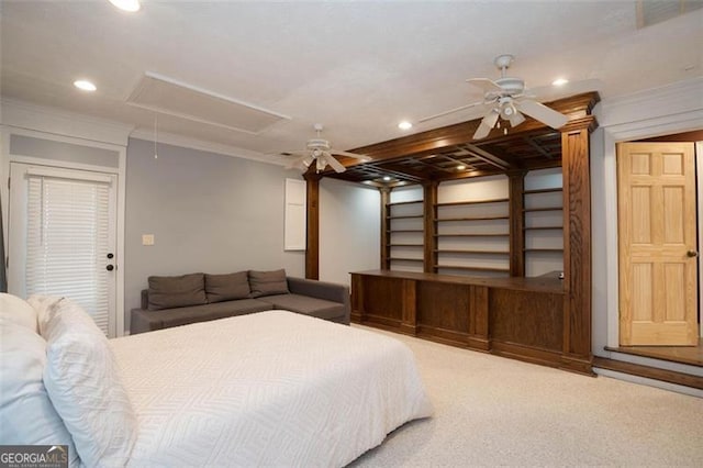 carpeted bedroom with crown molding and ceiling fan