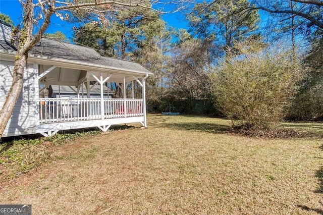 view of yard featuring a deck