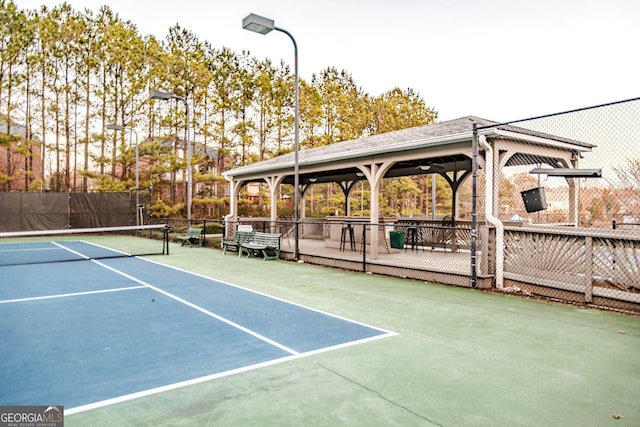 view of sport court featuring a gazebo