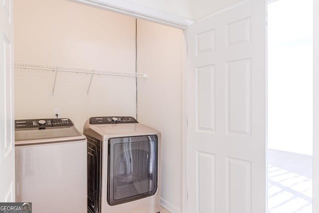 laundry area featuring washer and clothes dryer