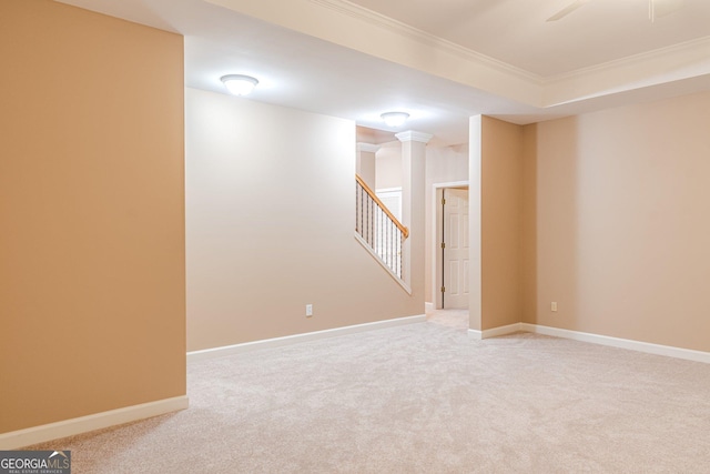 basement featuring crown molding and carpet floors