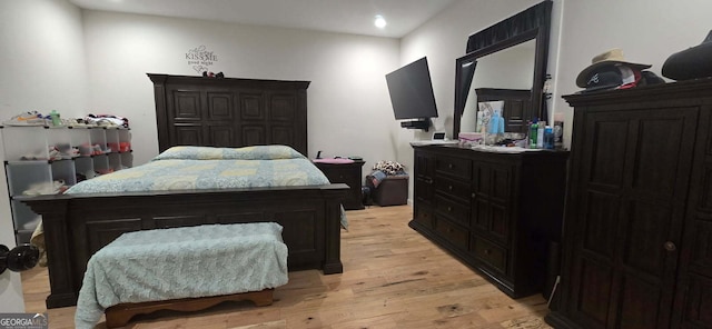 bedroom with light wood-style flooring