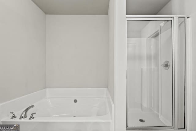 bathroom with independent shower and bath