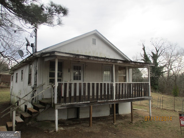 view of front of home featuring covered porch