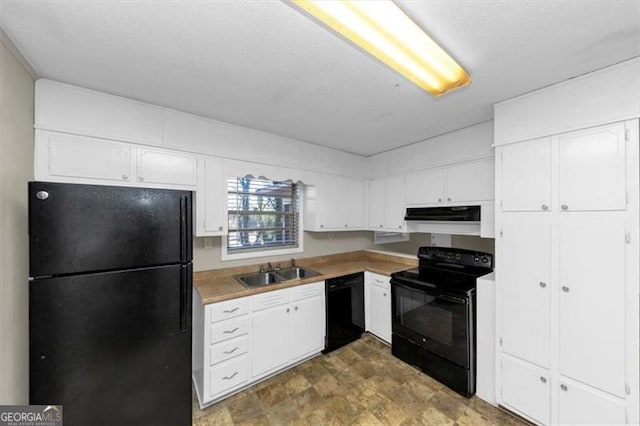 kitchen featuring white cabinetry, sink, and black appliances