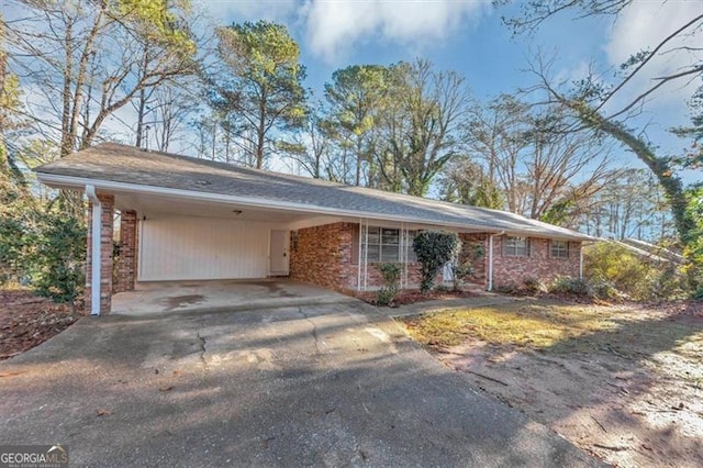 single story home with a carport