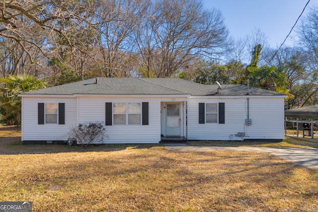 single story home with a front yard